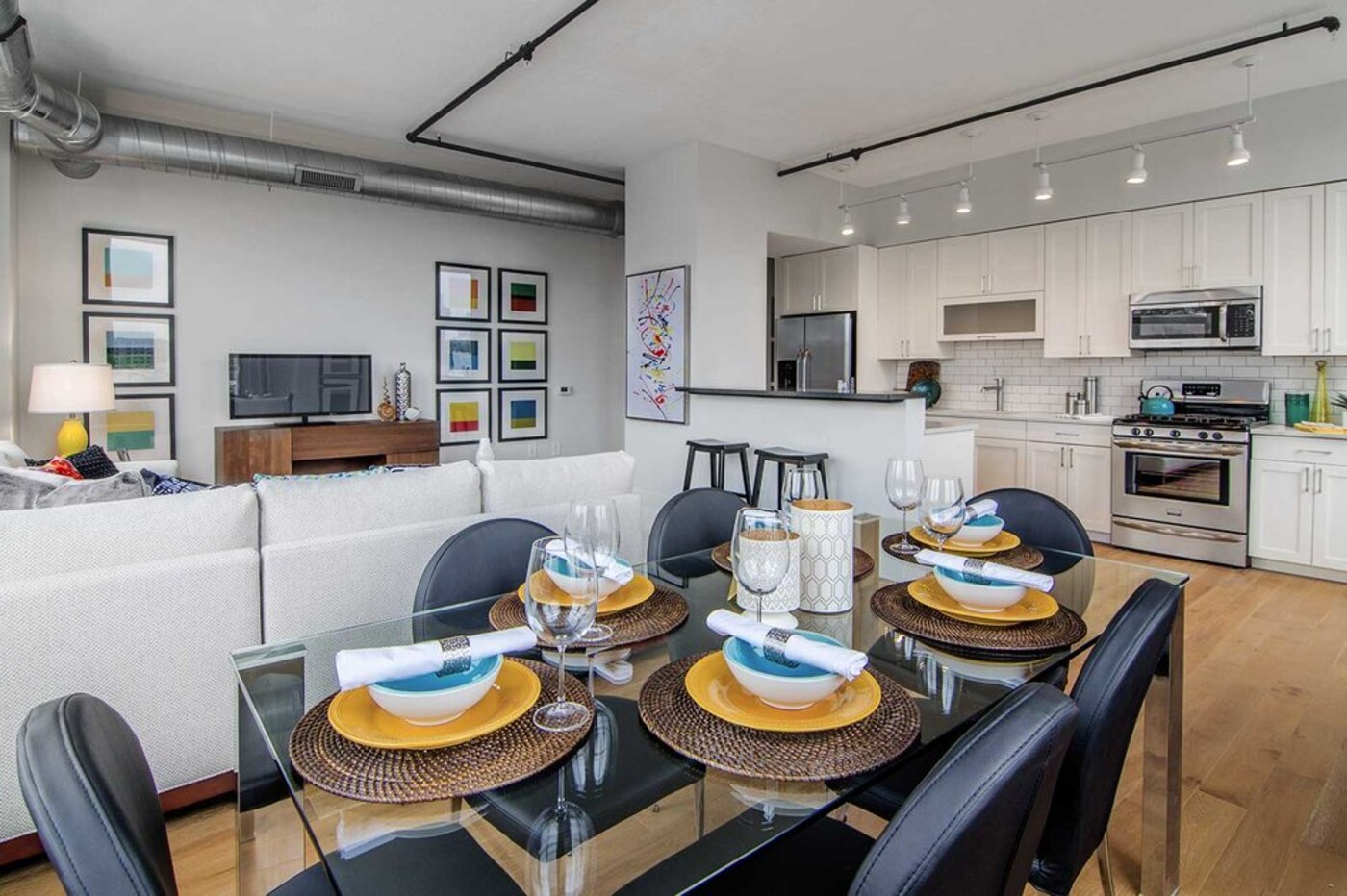 Wood floor through a kitchen and dining area